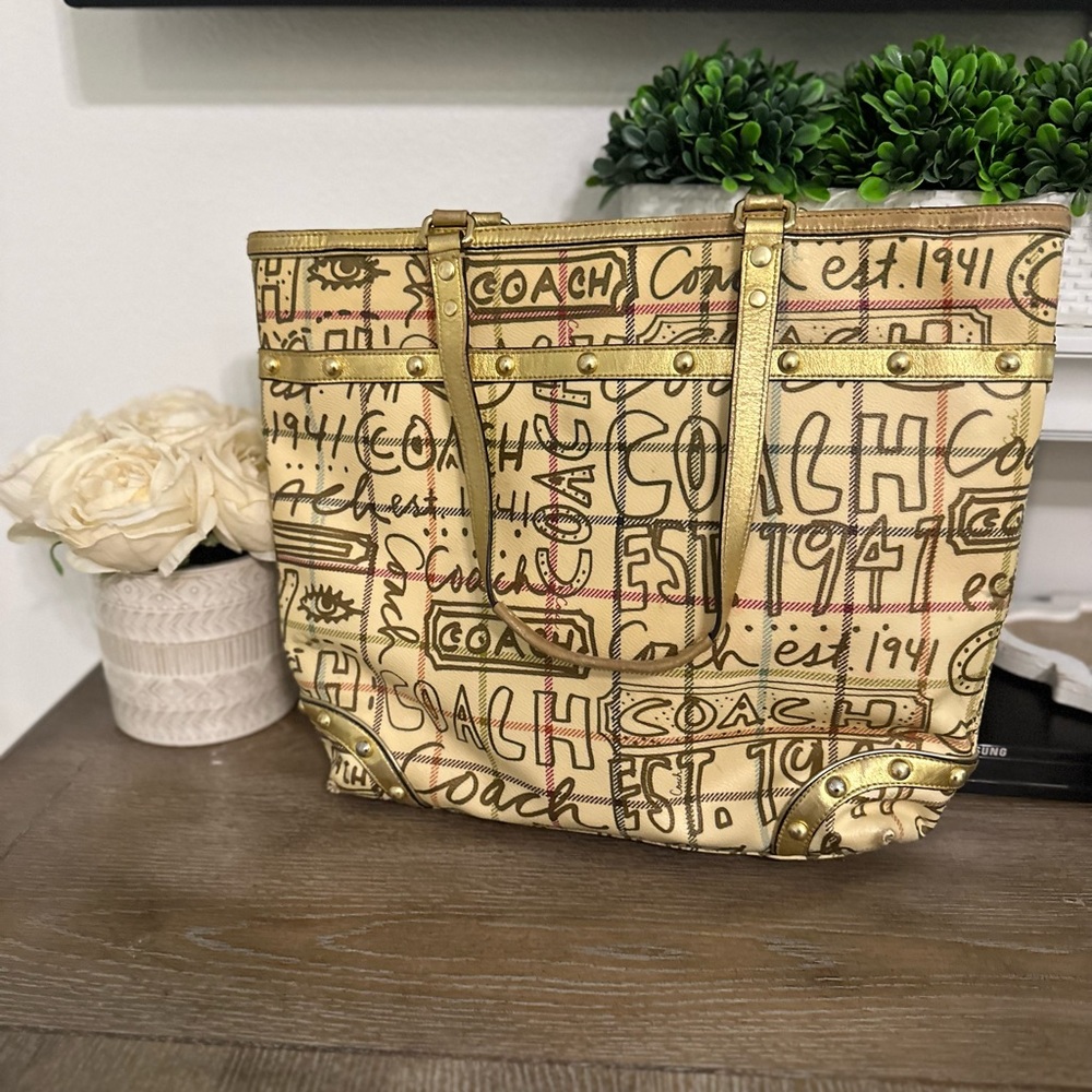 Gold coach purse